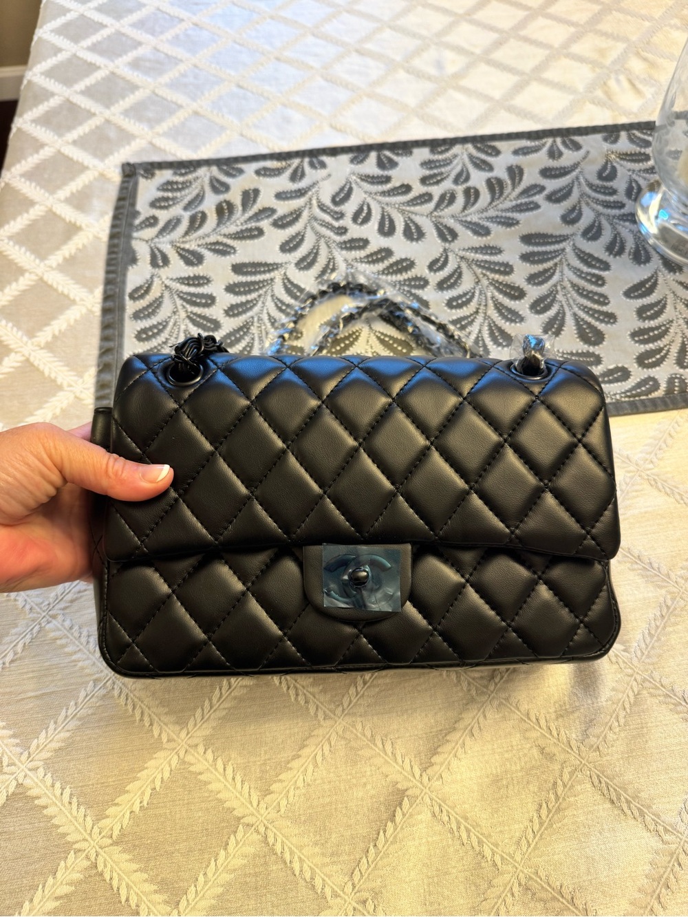 CHANEL Black Quilted Leather Shoulder Bag with Chain Strap
